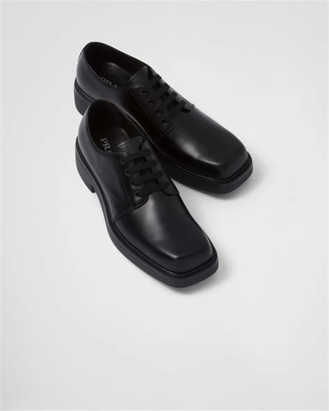 prada brushed leather derby shoes.